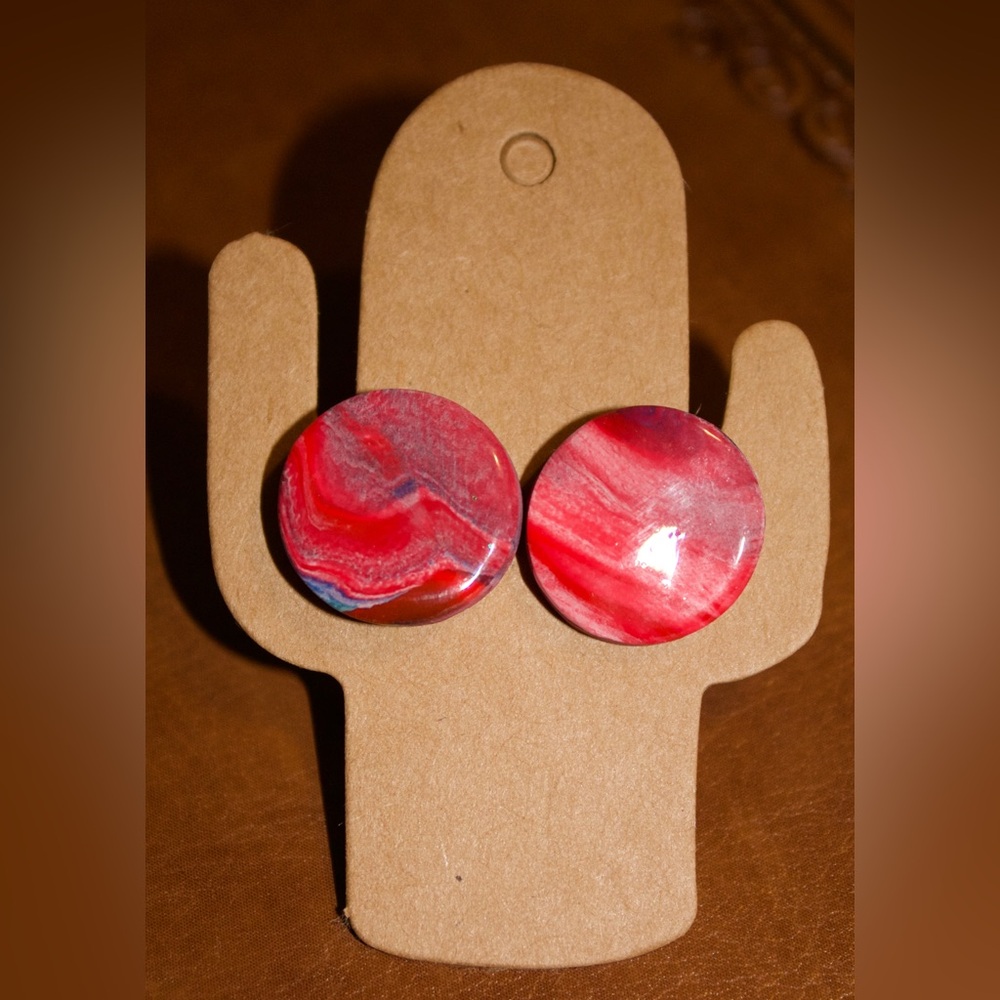 Clay stud earrings topped with resin